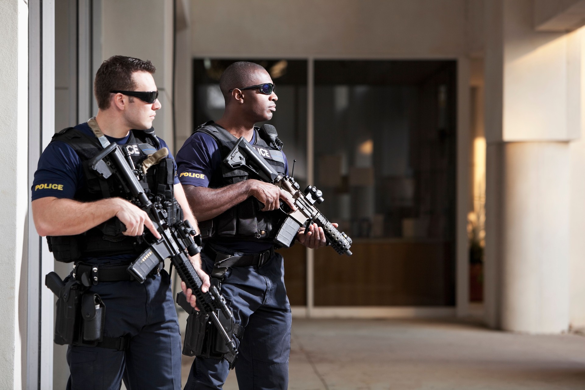 Police officers with rifles